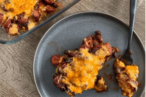 This tater tot casserole is loaded with melty cheese and crispy tater tots. Healthy Chili Dog Tater Tot Casserole with Cauliflower Tots