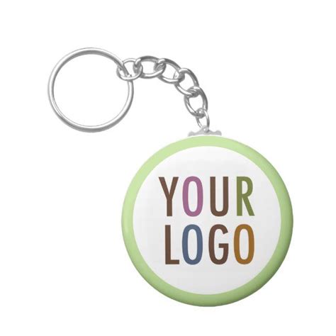 A Keychain With The Words Your Logo On It