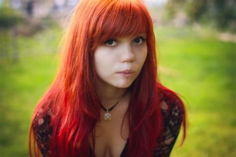 Premium Photo Portrait Of Sensuous Woman With Redhead Standing At Yard