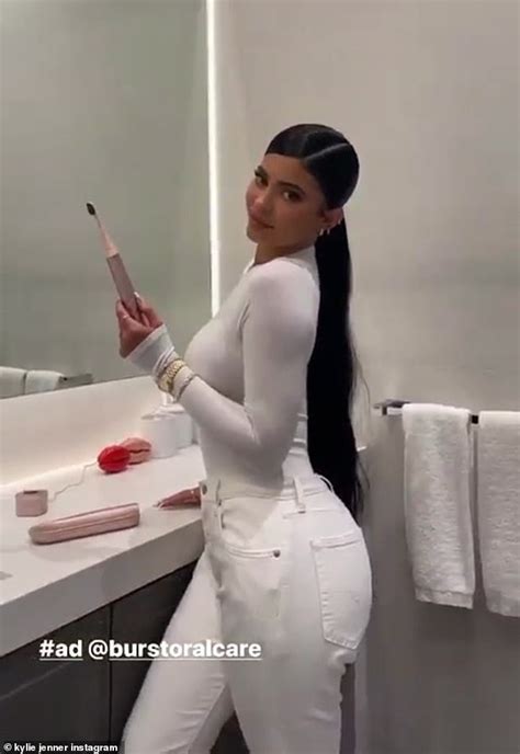Kylie Jenner Showcases Her Curves In A Skintight White Ensemble Daily