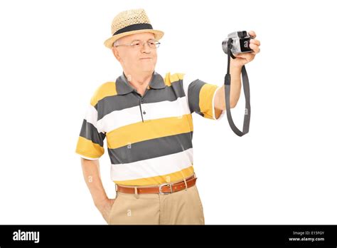 Mature Man Taking Picture Of Himself With Camera Stock Photo Alamy