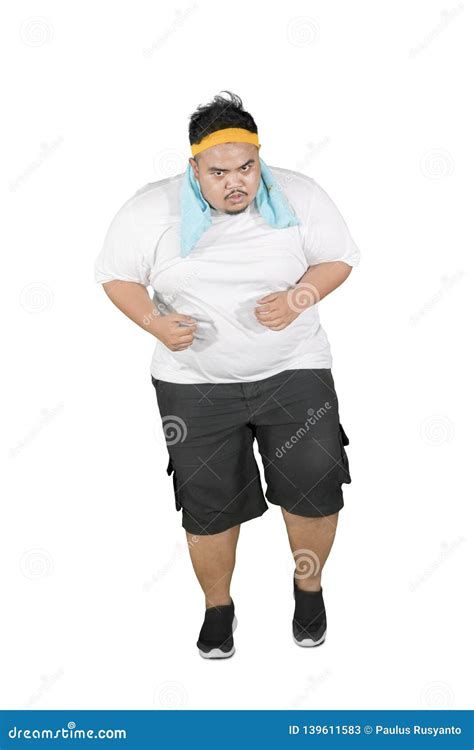 Tired Fat Man Doing Run Exercises In The Studio Stock Image Image Of