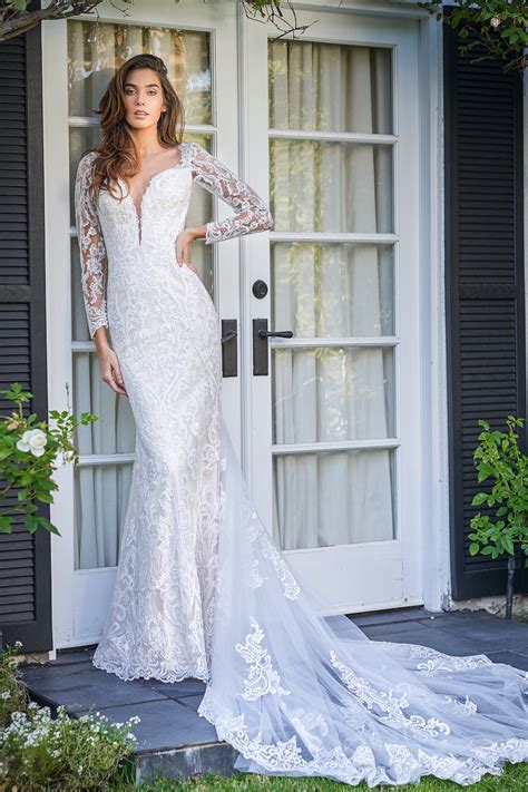 F221066 Elegant Long Sleeve Fit And Flare Gown With Plunging Neckline And Sexy Sheer Back