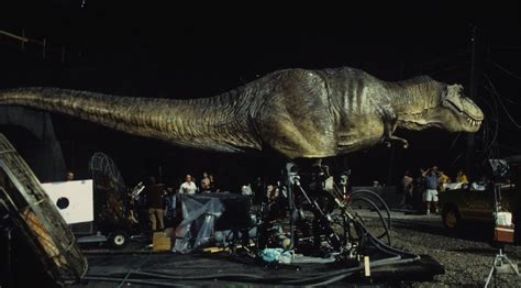 Crew Members Position The Giant Animatronic T Rex For A Scene In