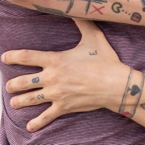Louis Tomlinson Tattoos Photos Meanings Of His Ink