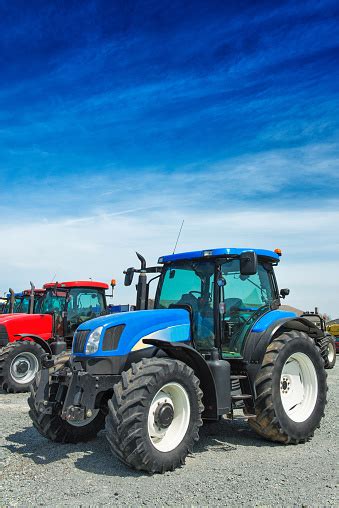 New Blue Farm Tractors For Sale Stock Photo Download Image Now Istock