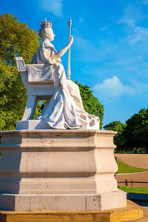 Statue Of Queen Victoria In Front Of Kensington Palace In London Uk