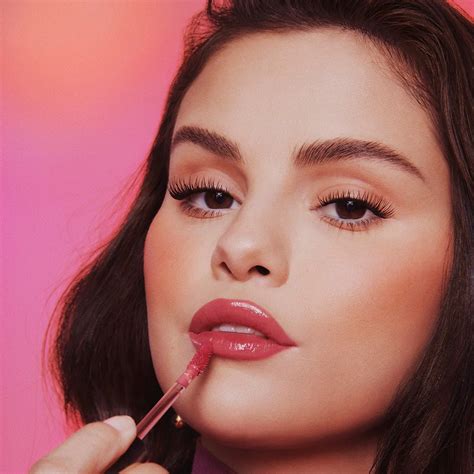 Glitter Magazine Selena Gomez Poses For New Rare Beauty Lip Oils