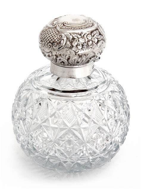 large antique victorian silver topped perfume bottle with a hinged lid per 39131 la86515