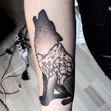 Wolf And Mountains Wolf Tattoos Lone Wolf Tattoo Arrow Tattoos