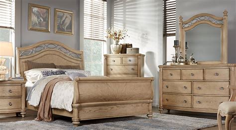 They include a dresser for your clothes, a nightstand for your personal belongings, and a mirror to check yourself before you go out. Affordable Sleigh Queen Bedroom Sets - Rooms To Go ...