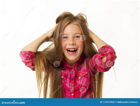 Young Beautiful Little Girl Smiles Holding Her Hair Over White B Stock