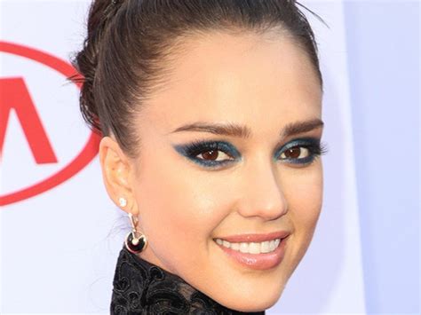 Jessica Alba Goes Futuristic With Structured Top Knot And Blue Eye Makeup