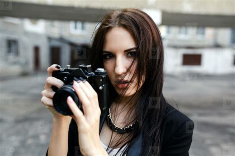 Beautiful Female Photographer Posing With Camera Stock Photo 188476