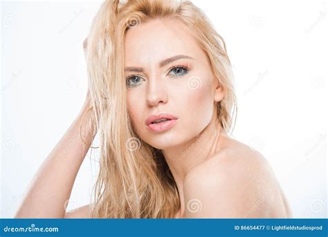 Sensual Naked Woman With Makeup And Hand On Head Looking To Camera On