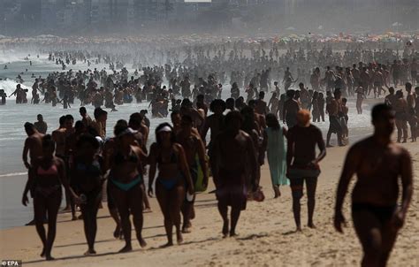 Thousands Pack On To Beaches In Rio De Janeiro Despite Brazil Suffering