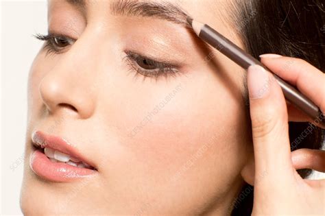 Woman Applying Eyebrow Pencil Stock Image F0212340 Science Photo