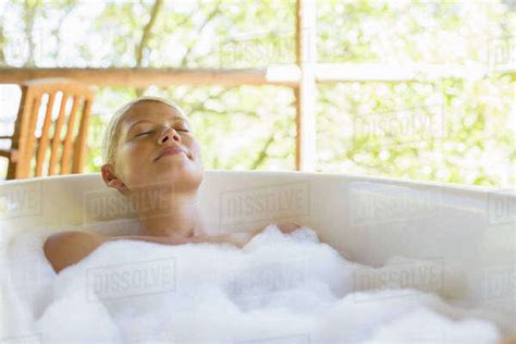 Woman Relaxing In Bubble Bath Stock Photo Dissolve