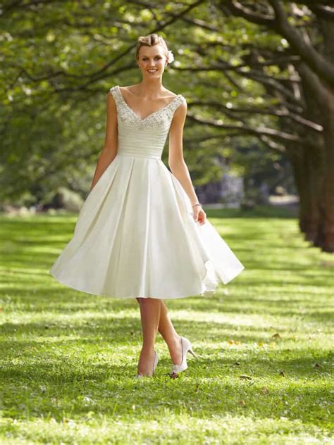 Details in these summer wedding dresses are i jewel straps or in a bow. Short Wedding Dresses that are Classy & Sassy