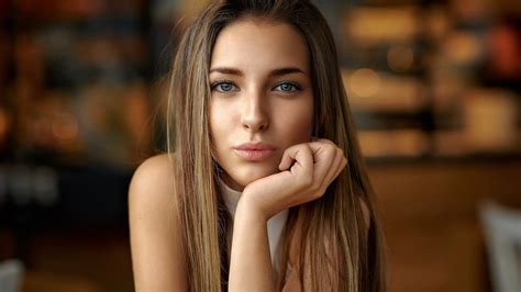 Grey Eyes Brunette Face Girl Model With Stare Look Is Wearing White
