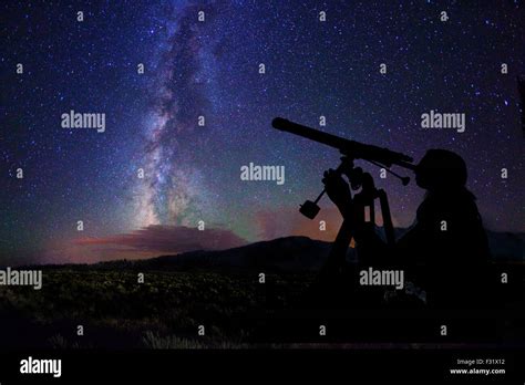 Young Girl Star Gazing Through Telescope Stock Photo Alamy