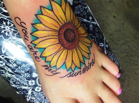 Foot tattoos for guys have really gained traction in the recent years. Pin by Ayla Grondahl on Tattoos | Sunflower foot tattoos ...
