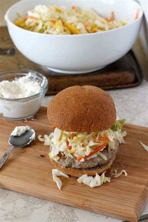 Jerk Turkey Burger With Creamy Feta And Mango Apple Slaw Belle Vie