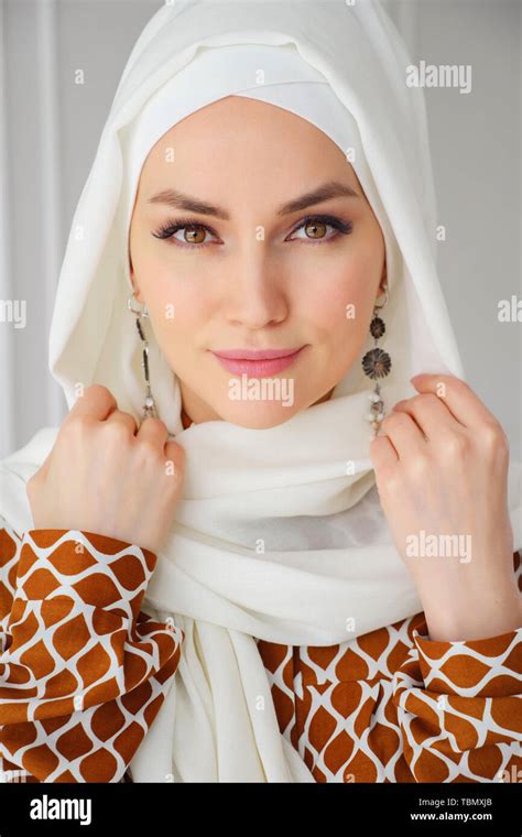 Portrait Of Beautiful Young Muslim Arabian Woman Wearing White Hijab