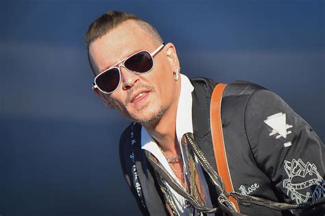 Johnny Depp Alters His Amber Heard Tattoo Again — This Time From Scum