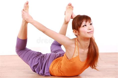 Young Japanese Woman Doing Yoga Bow Pose Stock Photo Image Of Moon