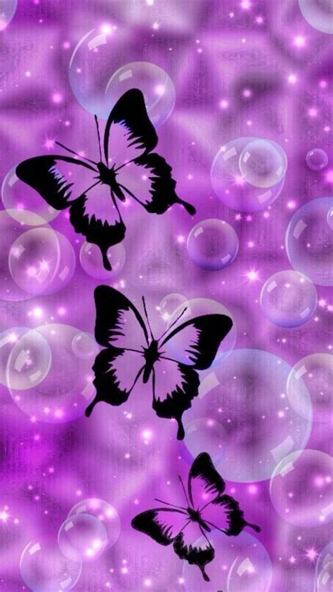 Three Butterflies Flying Through Bubbles On A Purple Background