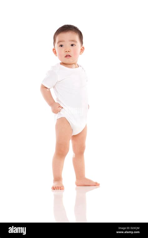 Cute Baby Boy Standing Hand On Hip Stock Photo Alamy