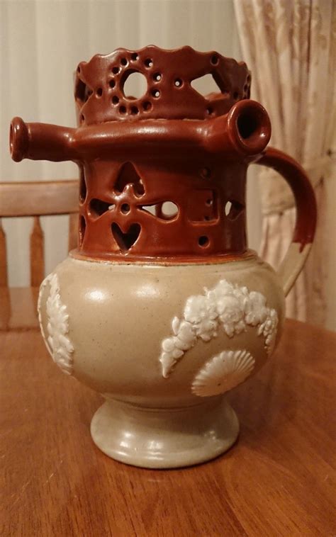An outstanding organic white tea. puzzle jug | Pottery, Tea pots, Tableware