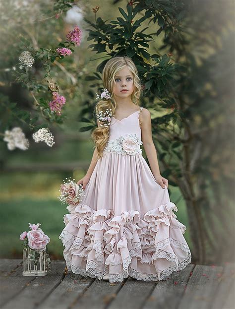 the cutest and most elegant little pink dress has arrived featuring an elasticated back bodice