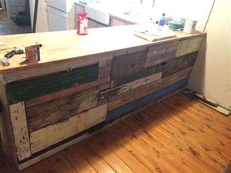 Then you probably know how expensive store purchased cabinets can be. Scrap Wood and shiplap on the back of the kitchen cabinets ...