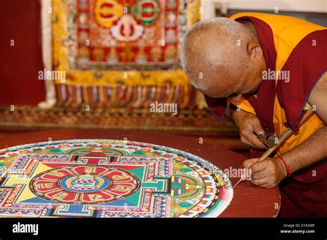 Buddhist Monk Drawing A Mandala Stock Photo Alamy