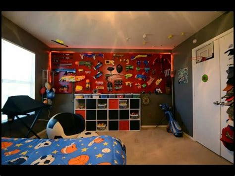 We build a nerf gun wall and it was really easy! Credit to Sara Rayburne. Great idea for Nerf Guns in boys ...