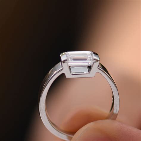Emerald Cut Diamond Solitaire Engagement Ring With Open Channel Setting