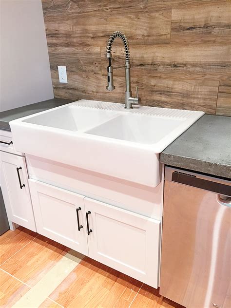 If you want the easiest way to cover a tile backsplash, then check out tile stickers or decals. Laminate Flooring Backsplash (It looks like WOOD!) - Bower ...
