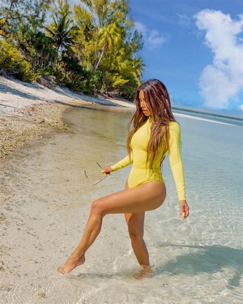 Kim Kardashian Sexy At Tropical Paradise In Yellow One Piece Swimsuit