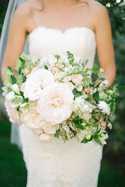 It features some gorgeous white lilies made with some of my favorite satin beads, yellow roses, some dendrobium orchids, ivy, and blue beaded ribbons. Rose, Lily of the Valley Lush Bridal Bouquet
