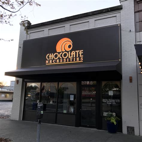 A New Storefront Sign And Awning For The Chocolate Necessities In