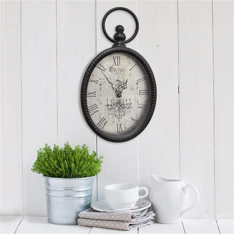 Stratton Home Decor Antique Black Oval Wall Clock S02198 The Home Depot