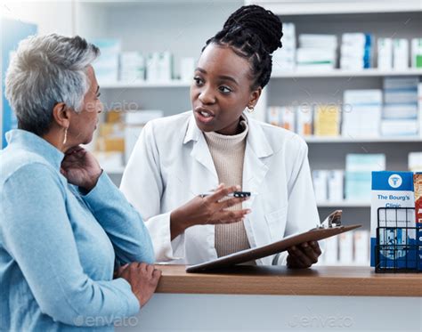 Pharmacy Medical Or Insurance With A Customer And Black Woman