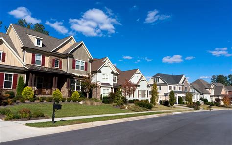 Street Of Large Suburban Homes King Real Estate Services