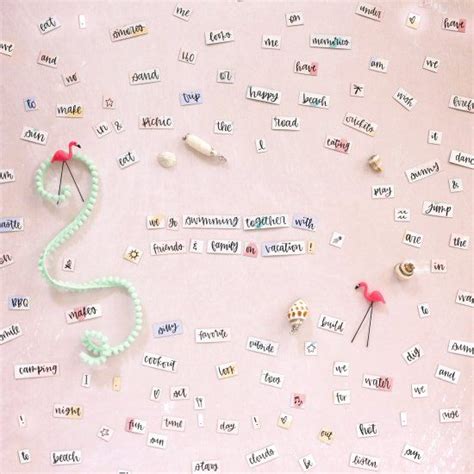 A Pink Wall Covered In Lots Of Different Types Of Pins And Magnets With