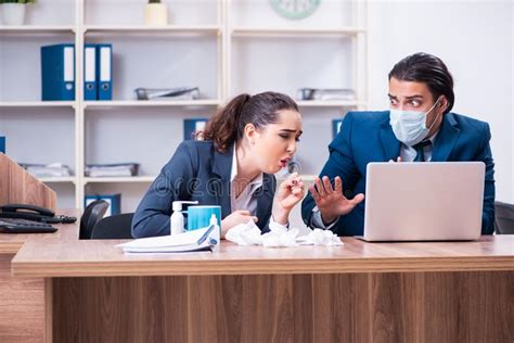 The Two Employees Suffering At Workplace Stock Image - Image of ...