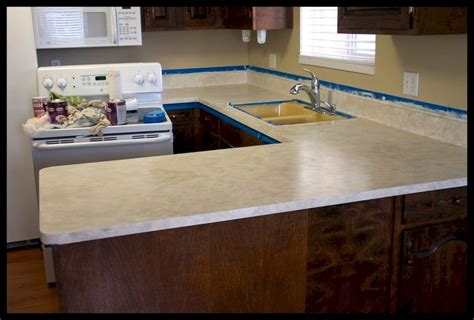 I contacted a painted and he sprayed the countertop with white apoxy paint and the countertops were beautiful and lasted 10 years plus before i replaced them. Top 50 Amazing Ideas For Your Kitchen Countertop Home to Z ...