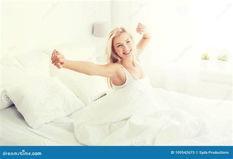 Young Woman Stretching In Bed At Home Bedroom Stock Image Image Of Happy Indoors 109542673
