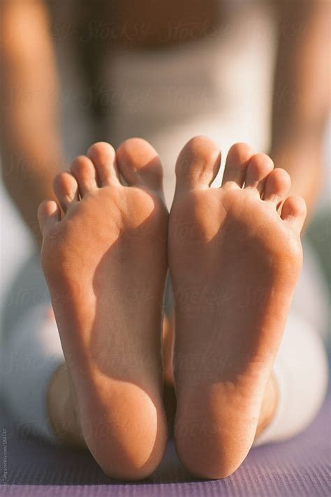 Woman Doing Yoga Closeup Of Her Bare Feet Del Colaborador De Stocksy Nabi Tang Stocksy